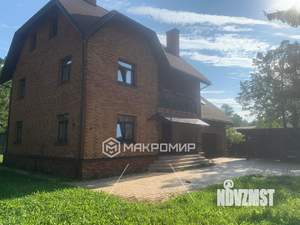 Дом 285м², 3-этажный, участок 12 сот.  