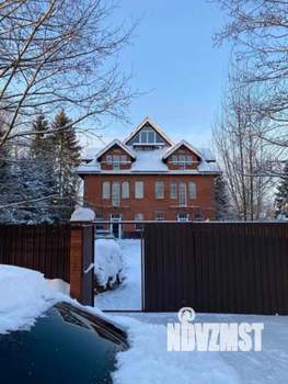 Коттедж 809м², 4-этажный, участок 12 сот.  