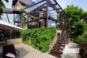 Коттедж 320м², 4-этажный, участок 6 сот.  