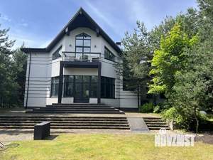 Коттедж 378м², 2-этажный, участок 15 сот.  