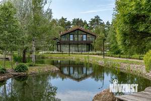 Коттедж 640м², 3-этажный, участок 12 сот.  